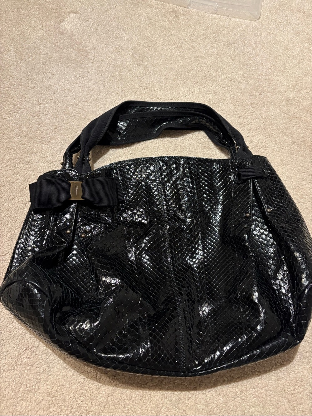 Authentic Ferragamo handbag. Top handle. Genuine leather python. Classy
